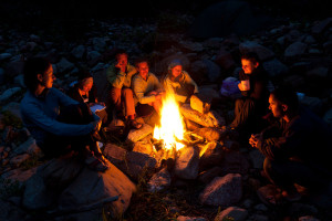 Group of backpackers at campfire shutterstock_59945146 300dpi